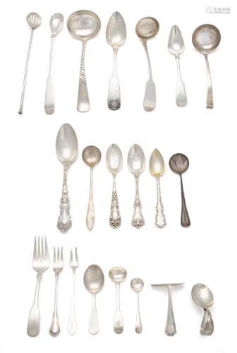 A group of sterling flatware items