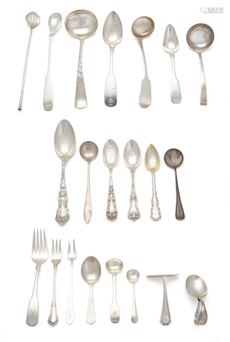 A group of sterling flatware items