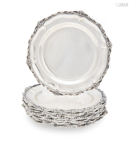 Twelve Italian silver bread plates