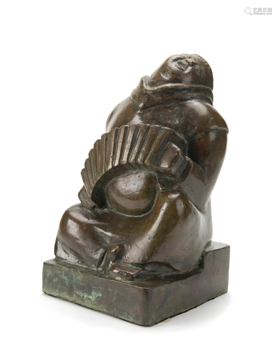 A bronze sculpture of a figure playing the accordion