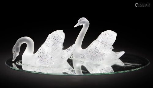 A pair of Lalique art glass swans