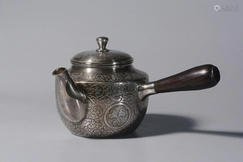 SILVER WATERPOT CAST WITH FLORAL AND HANDLE