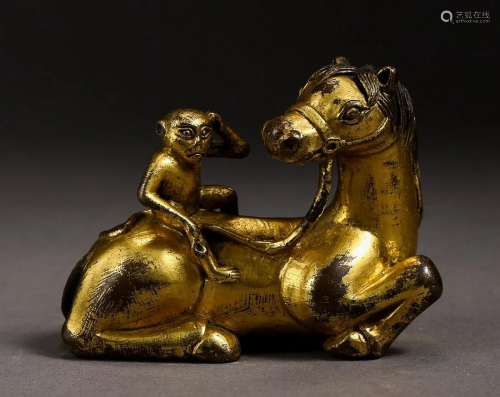 GILT-COPPER ALLOY ORNAMENT OF HORSE AND MONKEY
