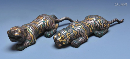 PAIR OF SILVER INSET COPPER ALLOY ORNAMENTS OF TIGER