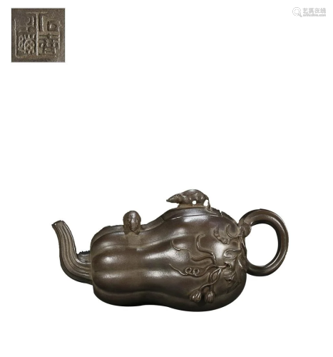 PUMPKIN FORM TEAPOT CARVED WITH MOUSE