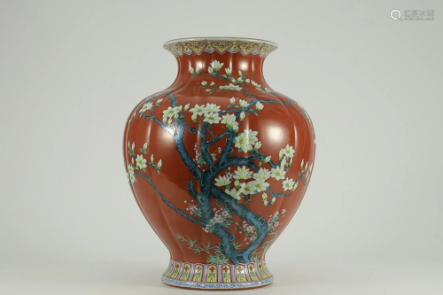 RED GROUND FAMILLE ROSE 'FLORAL' VASE WITH FLUTED SIDES
