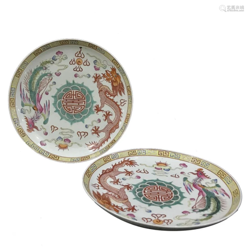 PAIR OF FAMILLE ROSE 'DRAGON AND PHOENIX' CHARGERS