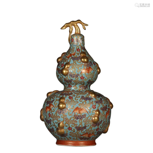 GREEN GROUND FAMILLE ROSE â€™FLORAL' DOUBLE-GOURD VASE