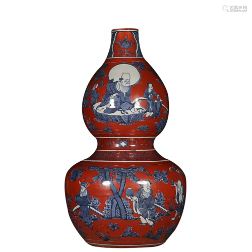 RED GROUND BLUE & WHITE 'FIGURE' DOUBLE-GOURD VASE