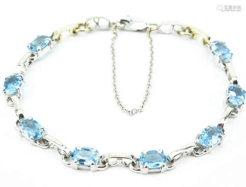 Vintage 14kt White Gold Blue Topaz Tennis Bracelet