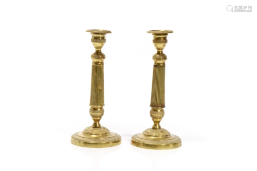 PAIR OF FRENCH EMPIRE BRASS CANDLESTICKS