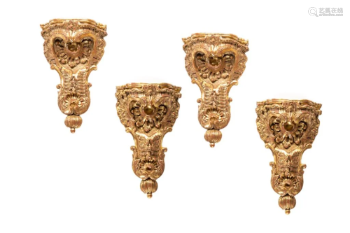 FOUR CARVED GILT WOOD WALL BRACKETS