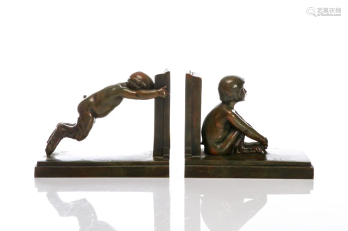 PAIR OF ART DECO PATINATED BRONZE FIGURAL BOOKENDS