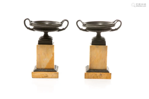 PAIR OF PATINATED BRONZE TAZZAS ON MARBLE BASES