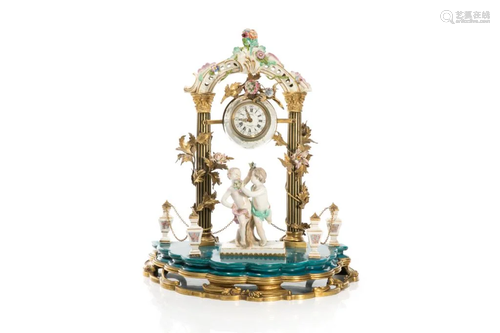 PORCELAIN AND GILDED METAL FIGURAL MANTLE CLOCK