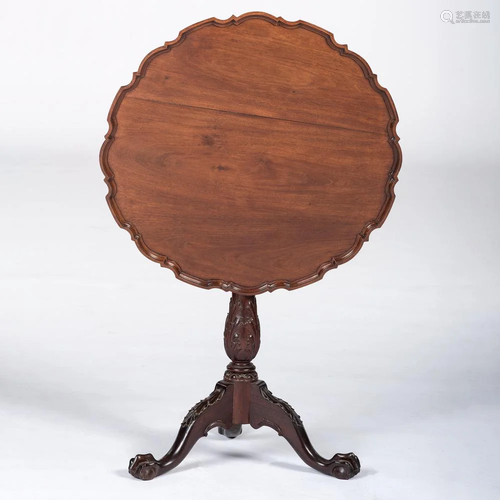 A Chippendale Mahogany Pie Crust Tea Table with Ball