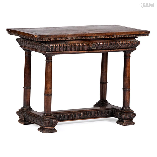 An Italian Carved and Inlaid Walnut Writing Table