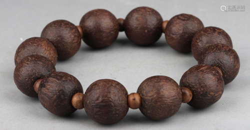 CHENXIANG WOOD STRING BRACELET WITH 12 BEADS