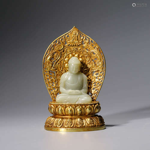 A CHINESE JADE SAKYAMUNI STATUE AND GOLD PANEL