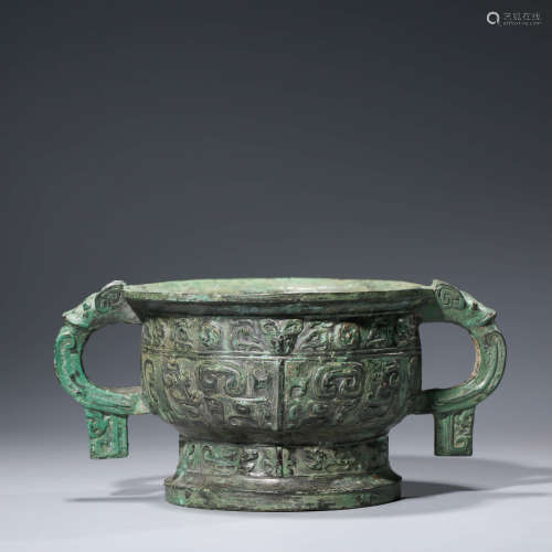 A CHINESE ARCHIASTIC BRONZE TAOTIE MASK STEAMING VESSEL, GUI