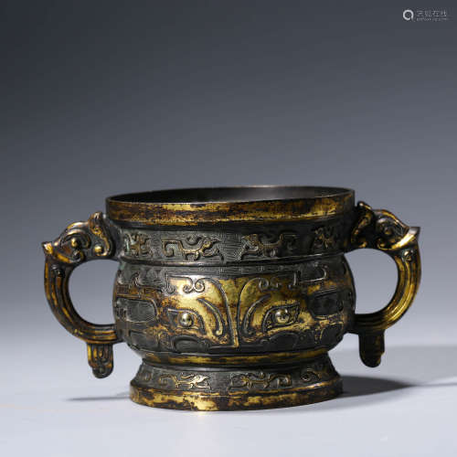 A CHINESE GILT-BRONZE TAOTIE MASK STEAMING VESSEL, GUI
