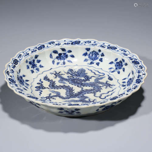 A CHINESE BLUE AND WHITE PORCELAIN DRAGON AND INTERLOCK BRANCHES LOEB DISH MARKED XUAN DE