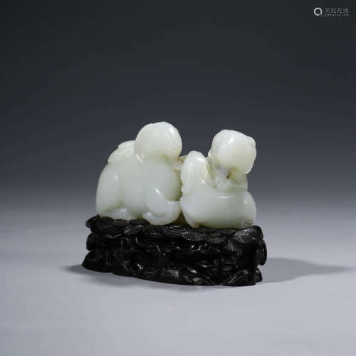 A SET CHINESE WHITE JADE RAMS AND STAND