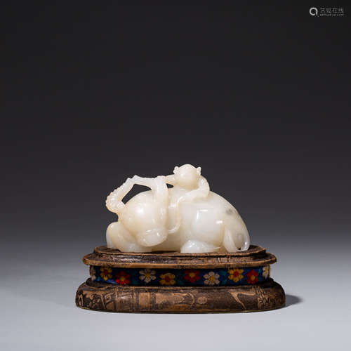 A CHINESE WHITE JADE WATER BUFFALO AND CHILD