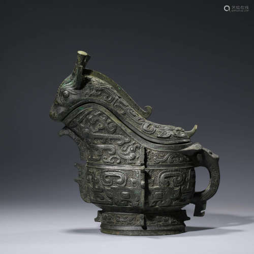 A CHINESE ARCHIASTIC BRONZE DRAGON-SHAPED WINE VESSEL, GONG