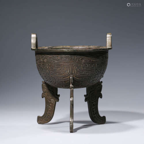 A CHINESE BRONZE TAOTIE MASK STEAMING VESSEL, DING