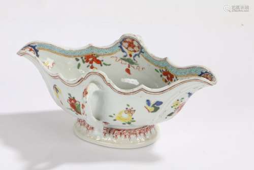 Chinese porcelain famille rose sauceboat, with foliate decoration and loop side handles