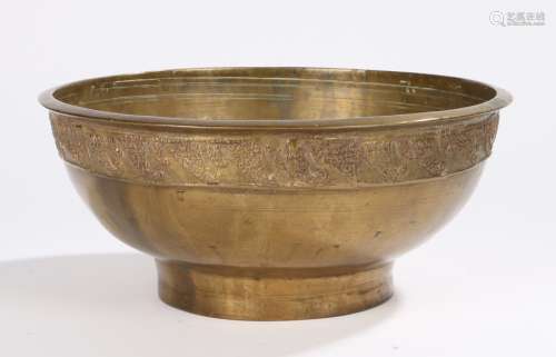 Indian brass bowl, with an arched design to the collar, 29cm wide