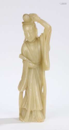 Chinese soapstone figure, of a standing figure with a hand above her head, 35.5cm high