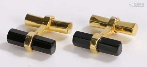 Pair of black onyx and silver gilt set cufflinks, with chamfered and hexagonal ends