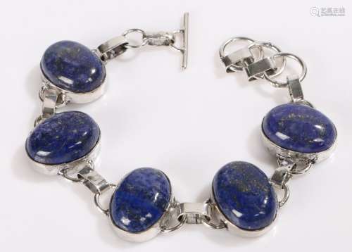 Lapis lazuli and silver bracelet, formed from five oval lapis lazuli panels