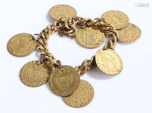 Gilt metal bracelet with nine hanging gaming tokens