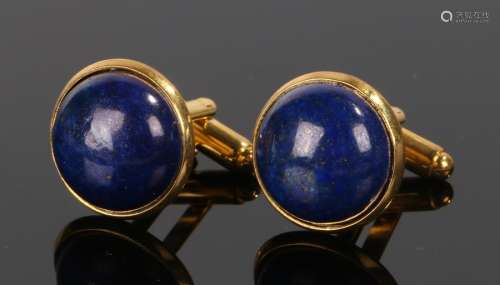 Pair of lapis lazuli cufflinks, with cabochon cut lapis lazuli set to gilt metal