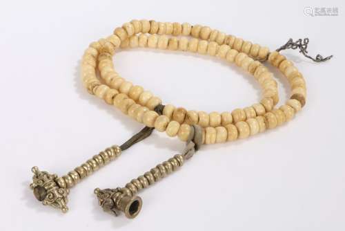 String of bone prayer beads, 80cm long
