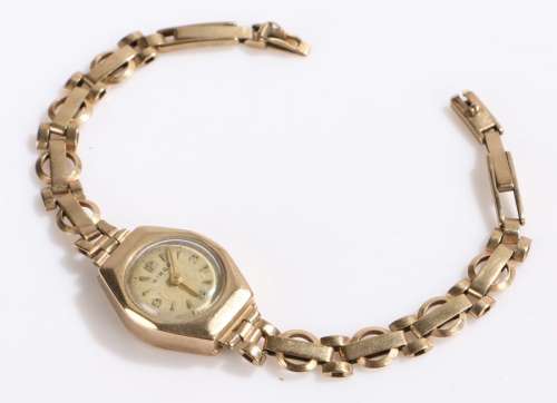 Hirgo 9 carat hold ladies wristwatch, the signed cream dial with Arabic and triangular markers,