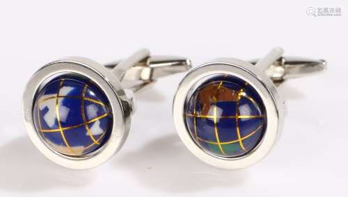 Pair of globe cufflinks, with rotating globes to the white metal cufflinks