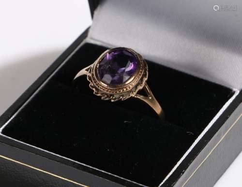 9 carat gold ring set with purple paste, ring size U1/2, 2.9g
