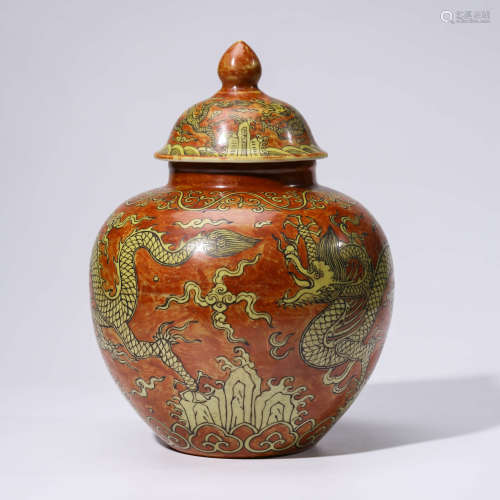 A CHINESE IRON-RED PORCELAIN DRAGON JAR AND COVER MARKED JIA JING