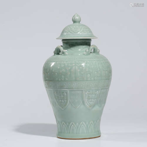 AN ARCHIASTIC CHINESE CELADON-GLAZED PORCELAIN JAR MARKED QIAN LONG