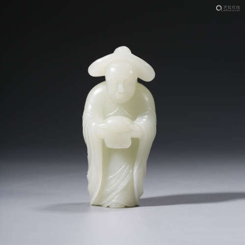 A CHINESE WHITE JADE FIGURE