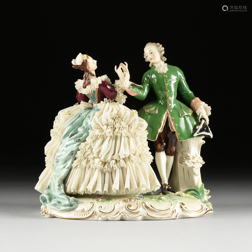 A GERMAN PORCELAIN LACE FIGURAL GROUP, 19TH/20TH