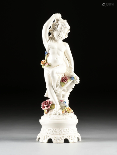 AN ITALIAN FLORAL EMBELLISHED MAJOLICA PUTTO LAM…