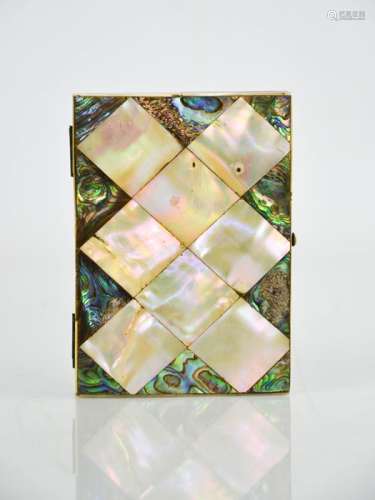 A 19th century mother of pearl card case, with blue silk lined interior, 10cm by 7½cm.