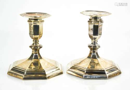 A pair of silver candlesticks, with weighted bases, Edinburgh, indistinct date mark, with
