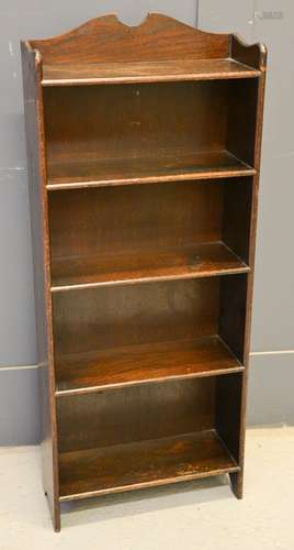 A bookcase by Waring & Gillows Ltd.,12cm by 46 by 18cm.