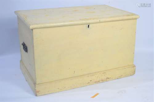 A wooden chest, painted cream, with twin handles. 45cm high by 75cm wide